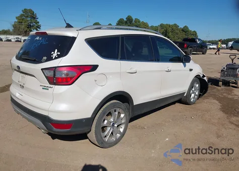 2018 Ford Escape Titanium z USA, uszkodzony, nr VIN 1FMCU0J93JUD20286